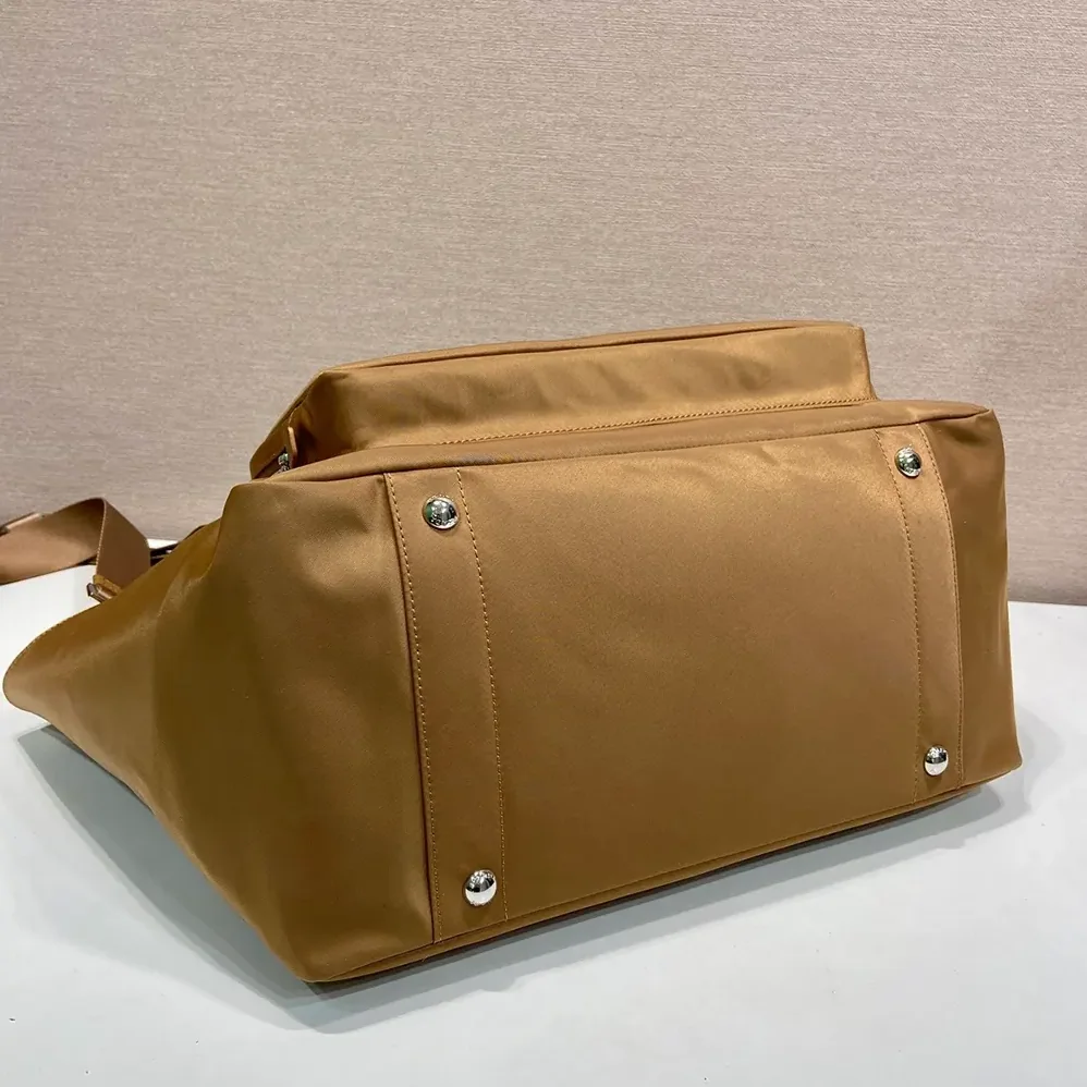 Prada Re-Nylon Baby Bag with Triangle Logo for Unisex in Brown Prada Re-Nylon Baby Bag with Triangle Logo for Unisex in Brown