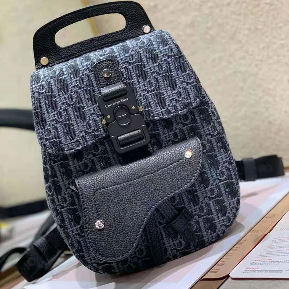 Dior Mini Saddle Backpack Dior Oblique Jacquard for Men in Black Dior Mini Saddle Backpack Dior Oblique Jacquard for Men in Black