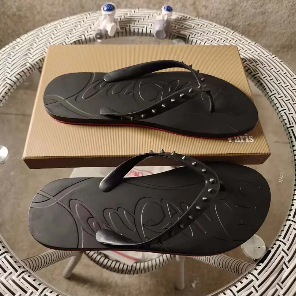 Christian Louboutin Loubi Donna Spike Red Sole Flip Flops for Men in Black Christian Louboutin Loubi Donna Spike Red Sole Flip Flops for Men in Black