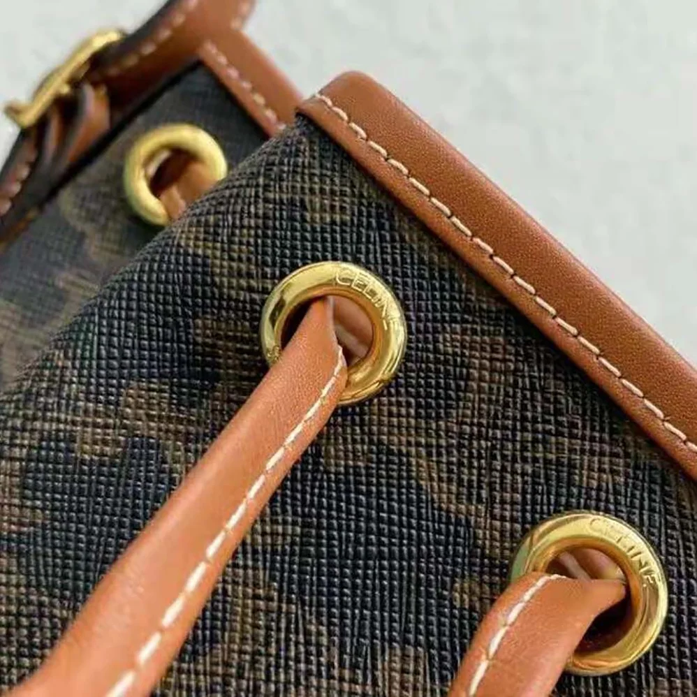 Celine Micro Drawstring in Triomphe Canvas and Calfskin for Women in Brown Celine Micro Drawstring in Triomphe Canvas and Calfskin for Women in Brown