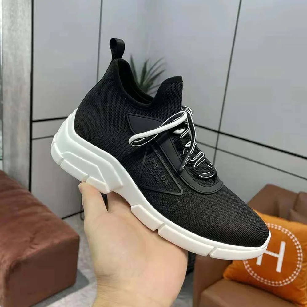 Prada The Triangle Logo Decorates These Knit Fabric Sneakers for Women in Black