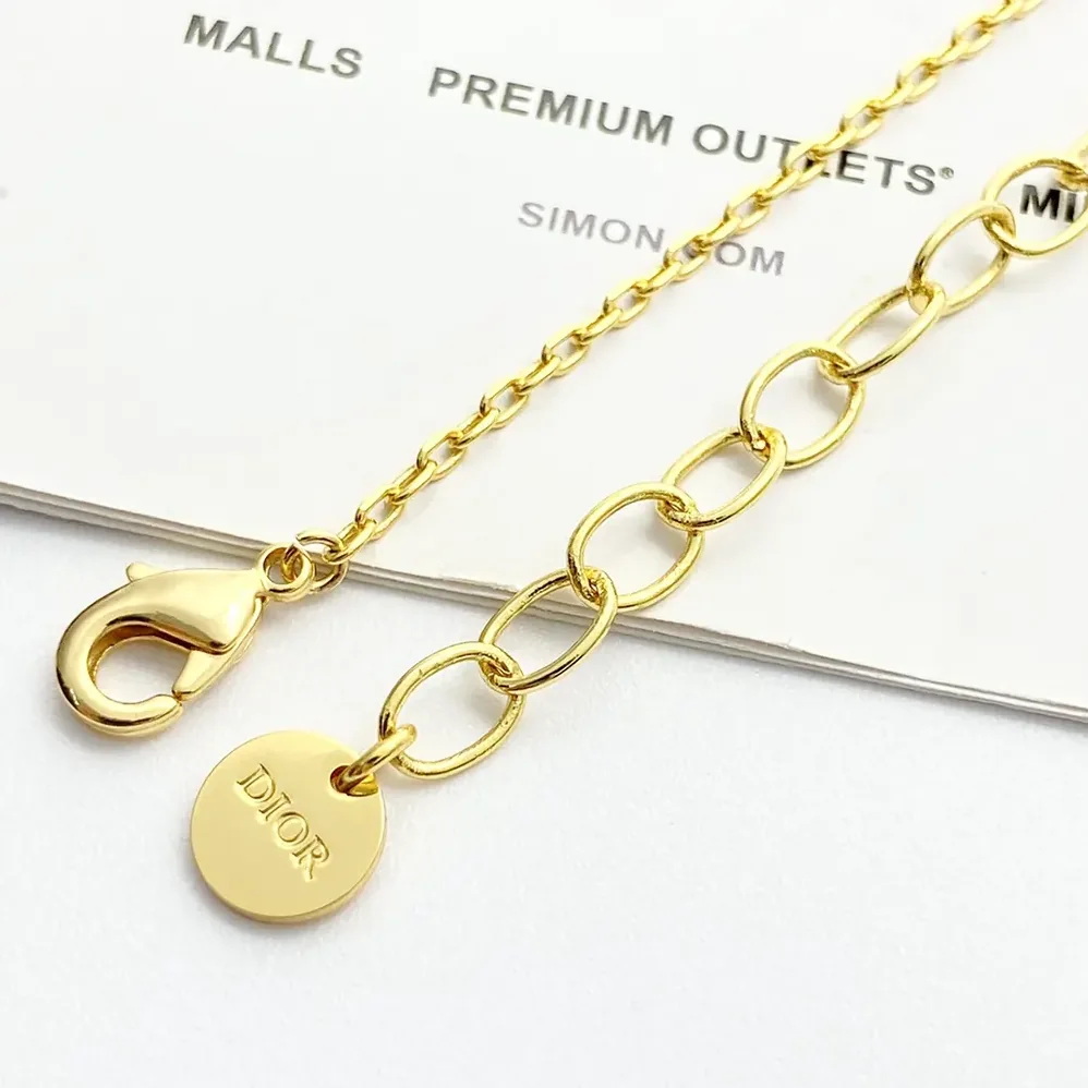 Dior Petit CD Lucky Charms Necklace Gold-Finish Metal with a White Resin Pearl and Silver for Women in Tone Crystals Dior Petit CD Lucky Charms Necklace Gold-Finish Metal with a White Resin Pearl and Silver for Women in Tone Crystals