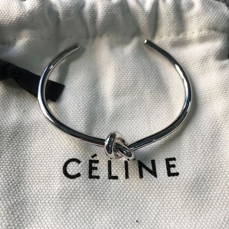 Celine Knot Extra-Thin Bracelet in Brass with Rhodium Finish for Women in Silver Celine Knot Extra-Thin Bracelet in Brass with Rhodium Finish for Women in Silver