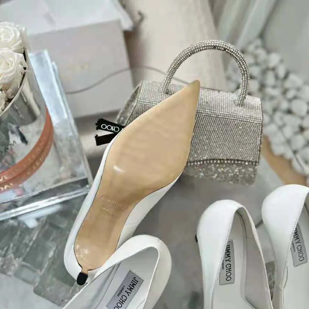 Jimmy Choo Romy 85 Latte Nappa Leather Pumps with Jimmy Choo Bow for Women Jimmy Choo Romy 85 Latte Nappa Leather Pumps with Jimmy Choo Bow for Women