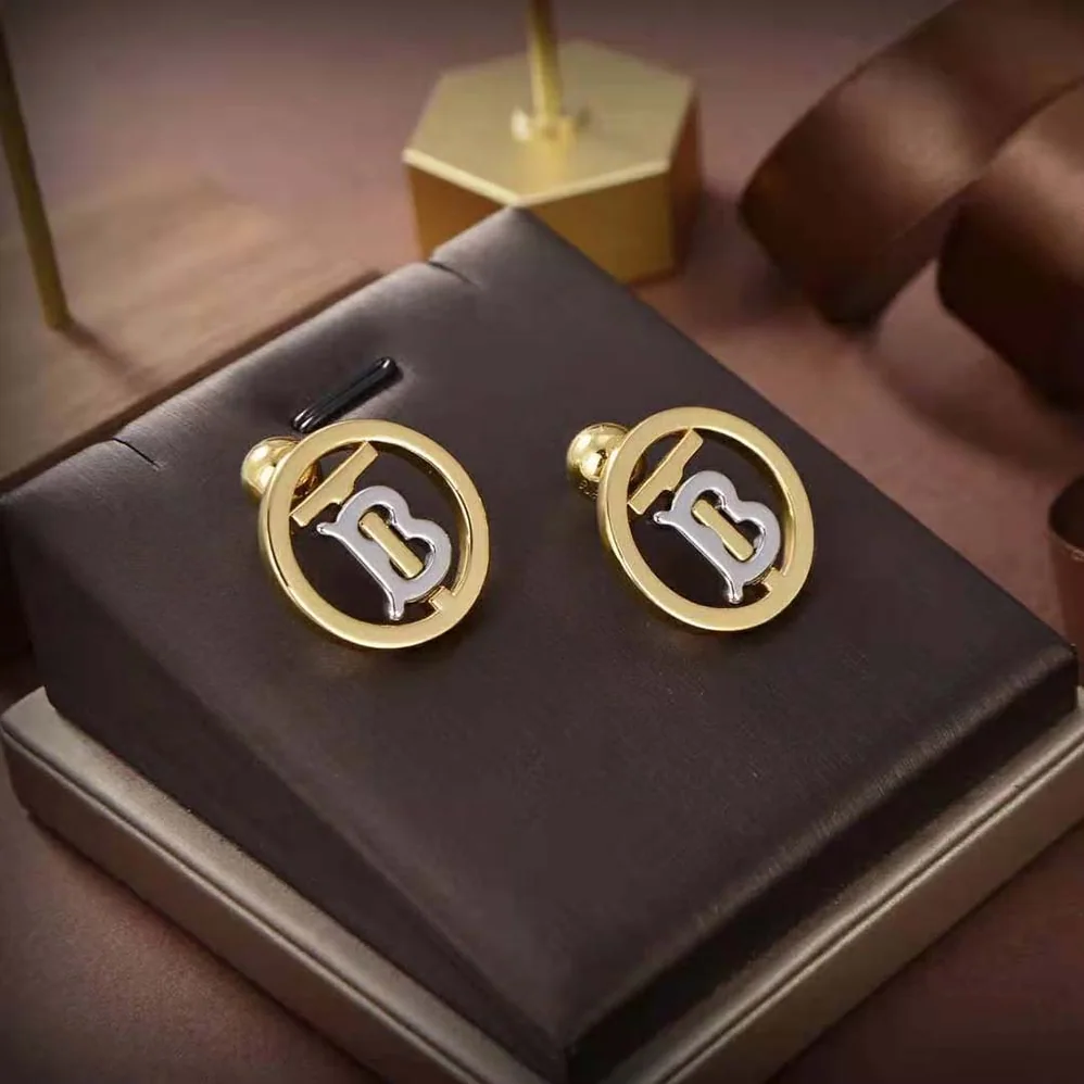 Burberry Gold and Palladium for Women in plated Monogram Motif Earrings Burberry Gold and Palladium for Women in plated Monogram Motif Earrings