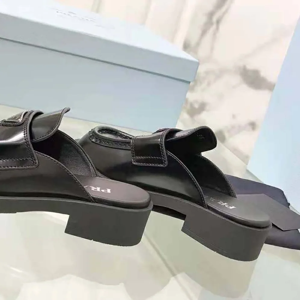 Prada Chocolate Brushed Leather Mules for Women in Black