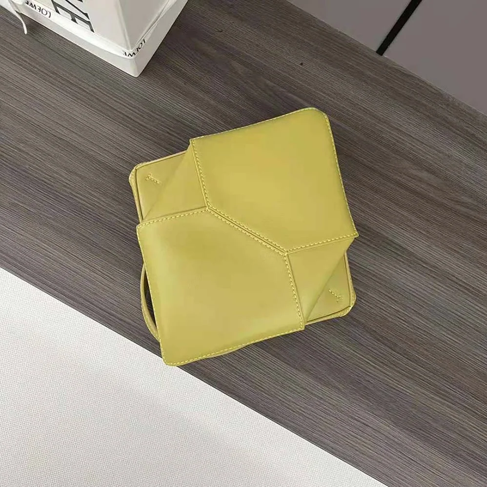 Loewe Mini Puzzle Fold Tote in Shiny Calfskin for Unisex in Yellow Loewe Mini Puzzle Fold Tote in Shiny Calfskin for Unisex in Yellow