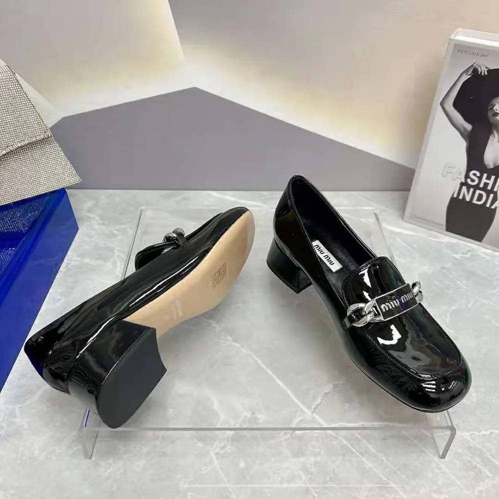 Miu Miu Patent Leather Loafers in 35 mm Heel Height for Women in Black