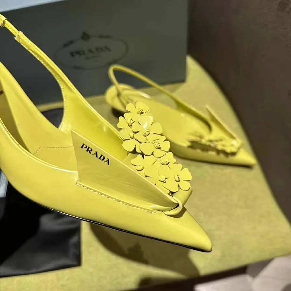 Prada Brushed Leather Slingback Pumps with Floral Appliques for Women in Yellow