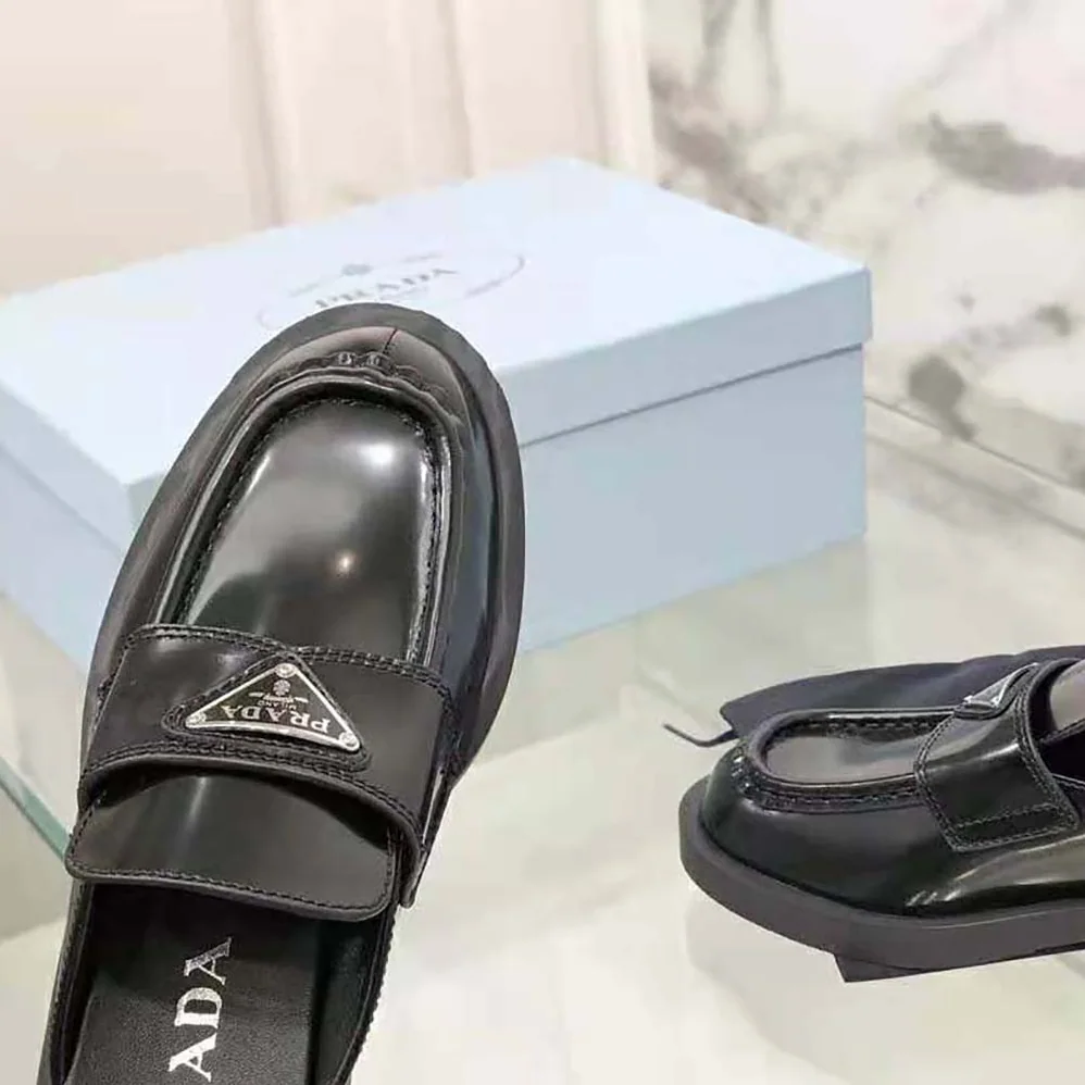 Prada Chocolate Brushed Leather Mules for Women in Black