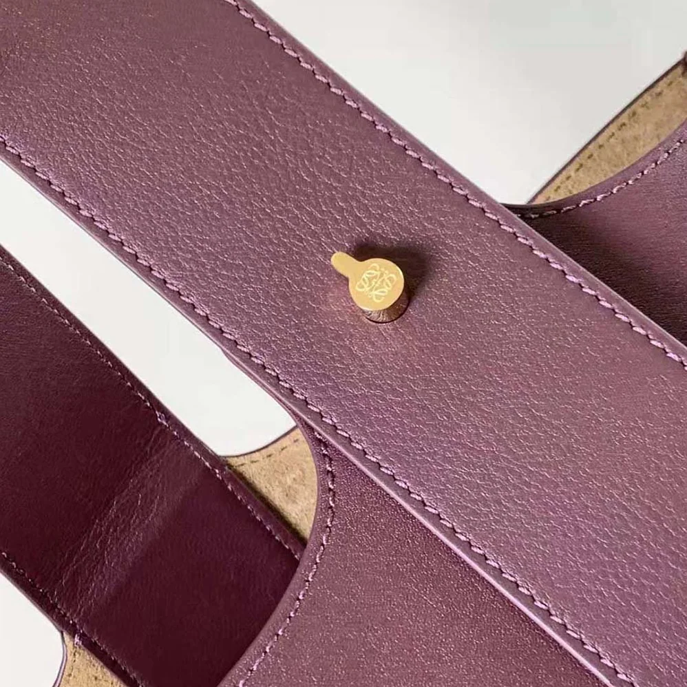 Loewe Mini Pebble Bucket Bag in Mellow Calfskin for Unisex in Maroon