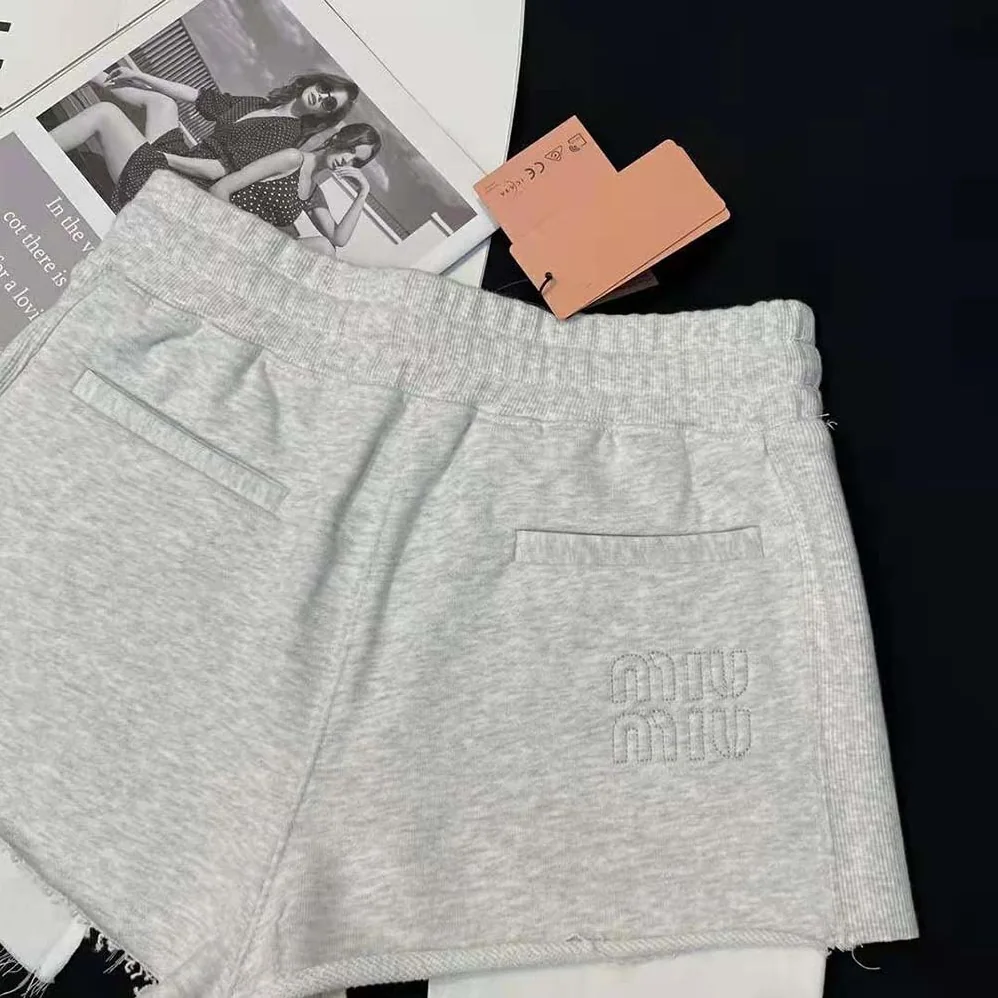 Miu Miu Embroidered Cotton Fleece Shorts for Women in Silver