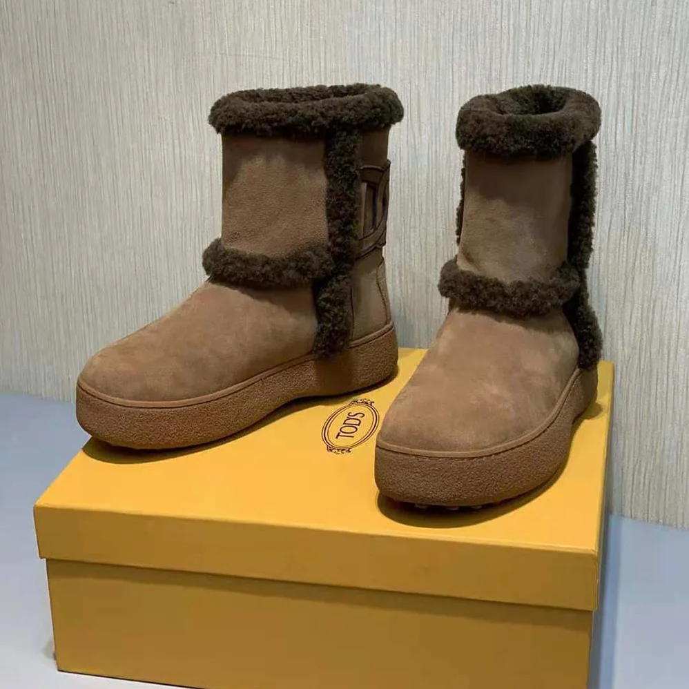 TODS Tod's W. G. Ankle Boots in Suede for Unisex in Brown
