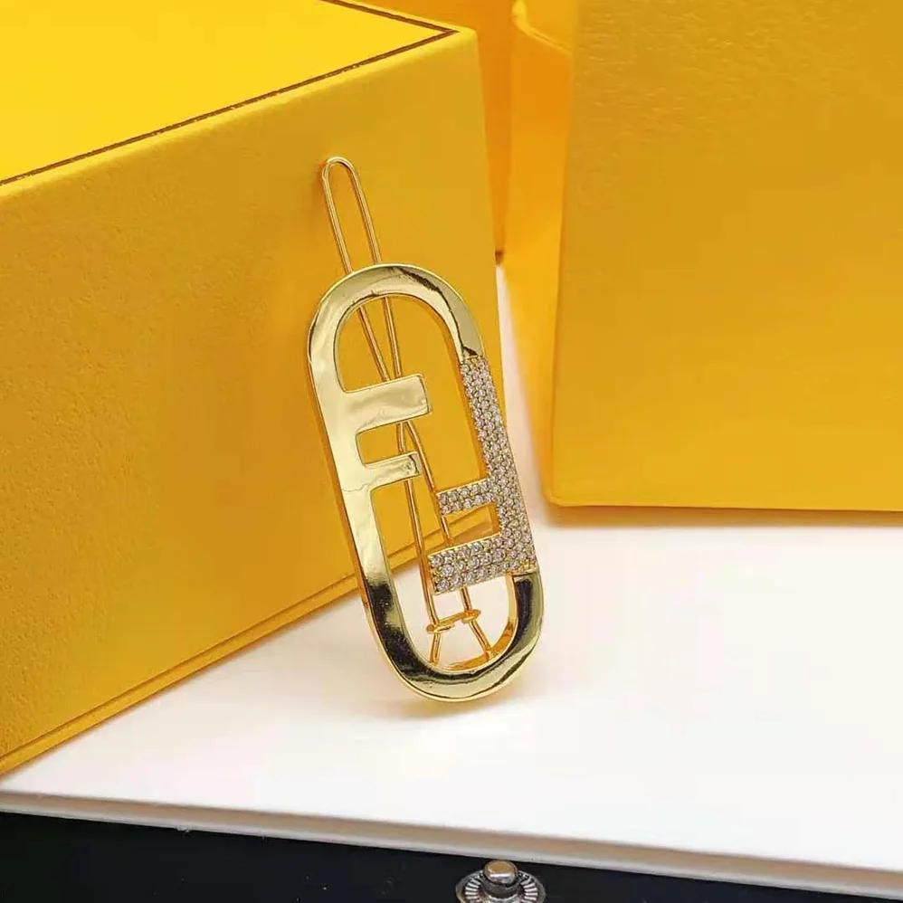 Fendi O'Lock Hair Clip Gold for Women in Coloured Fendi O'Lock Hair Clip Gold for Women in Coloured