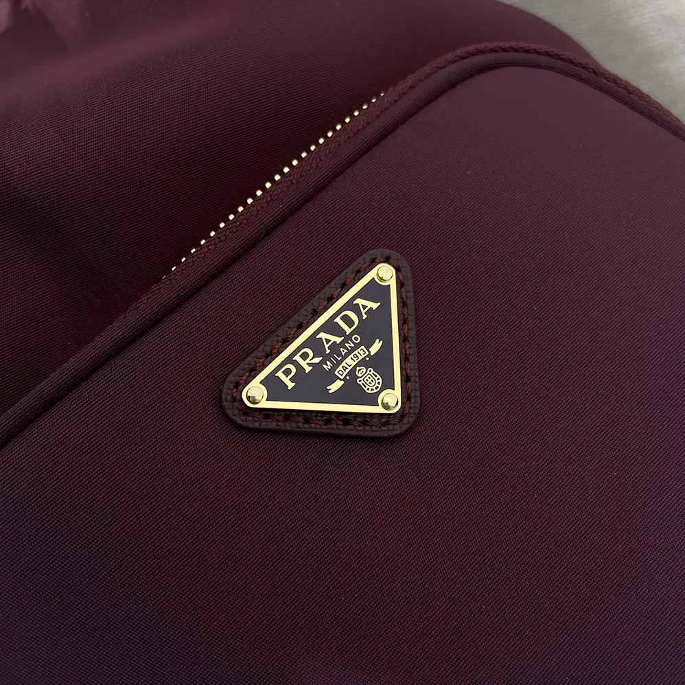 Prada Duet Re-Nylon Bucket Bag for Women in Maroon Prada Duet Re-Nylon Bucket Bag for Women in Maroon