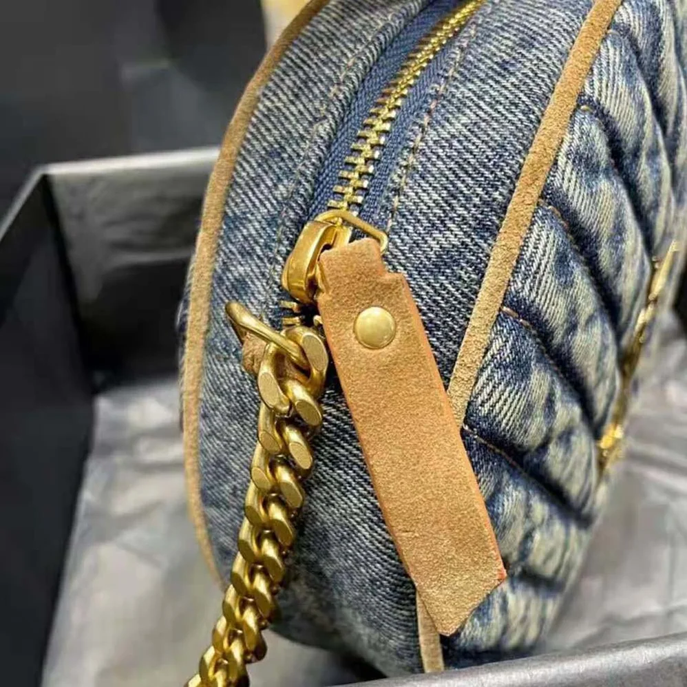 Saint Laurent YSL Vinyle Round Camera Bag in Chevron for Women in Quilted Denim and Suede Saint Laurent YSL Vinyle Round Camera Bag in Chevron for Women in Quilted Denim and Suede