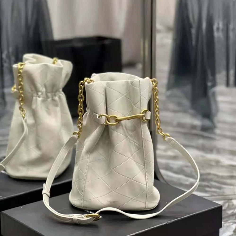 Saint Laurent YSL Le Maillon Hook Bucket Bag in Supple Leather for Women in White Saint Laurent YSL Le Maillon Hook Bucket Bag in Supple Leather for Women in White