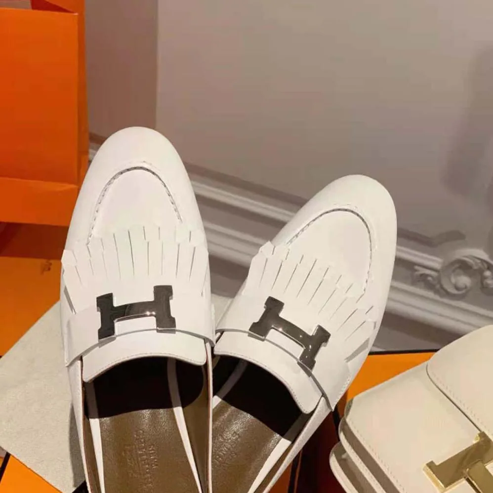 Hermes Rivoli Mule Mule in Calfskin with Fringe Detail for Women in White Hermes Rivoli Mule Mule in Calfskin with Fringe Detail for Women in White