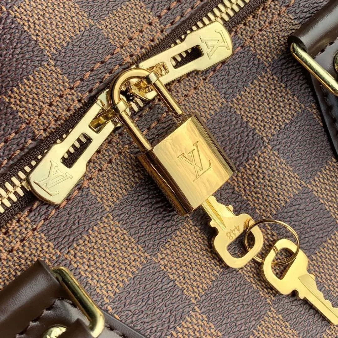 Louis Vuitton Speedy Bandouliere 25 Top Handle Bag in Brown Gold Hardware
