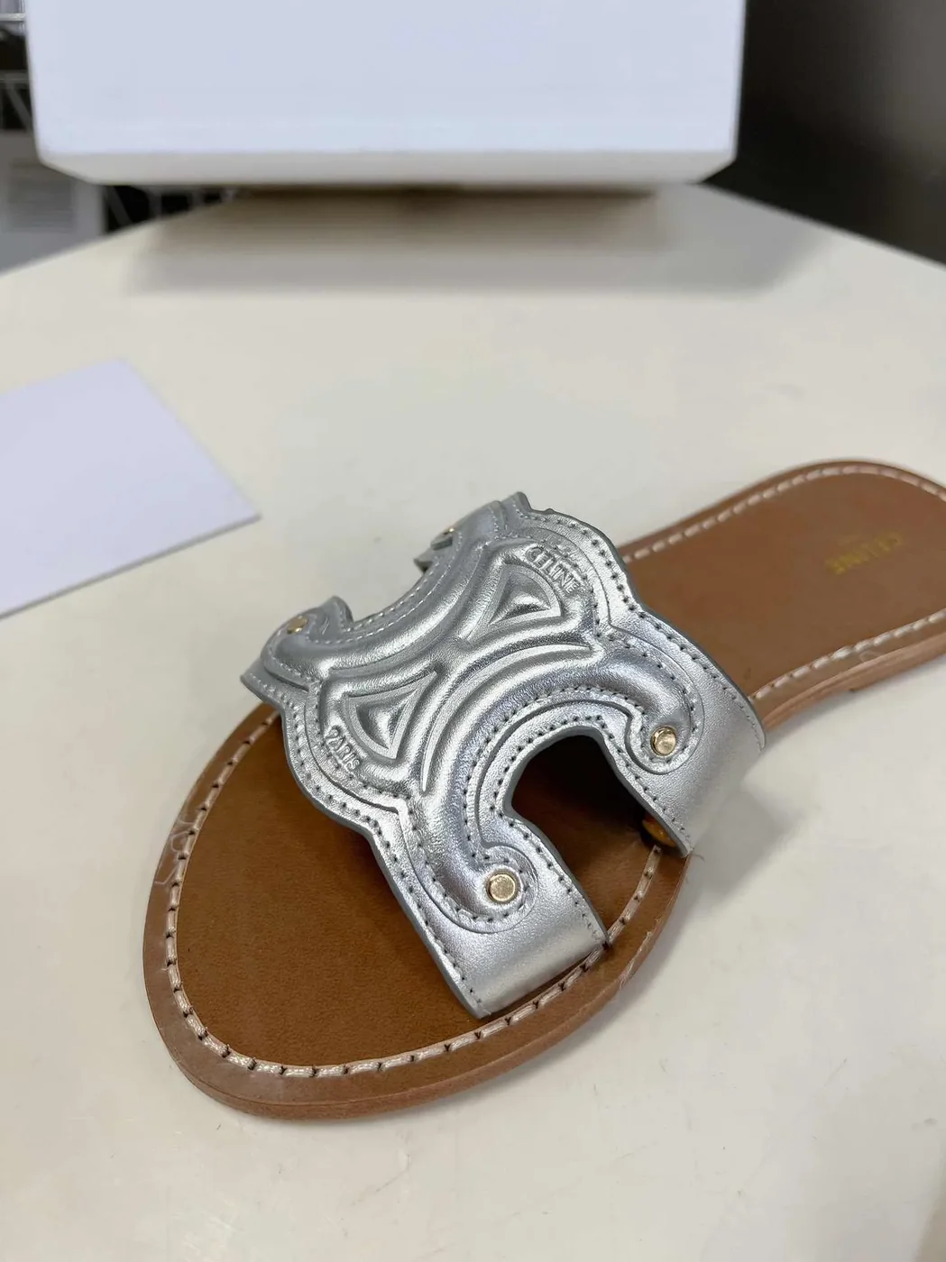 Celine Triomphe Mule In Metalized Sliver Tone .36PN Celine Triomphe Mule In Metalized Sliver Tone .36PN
