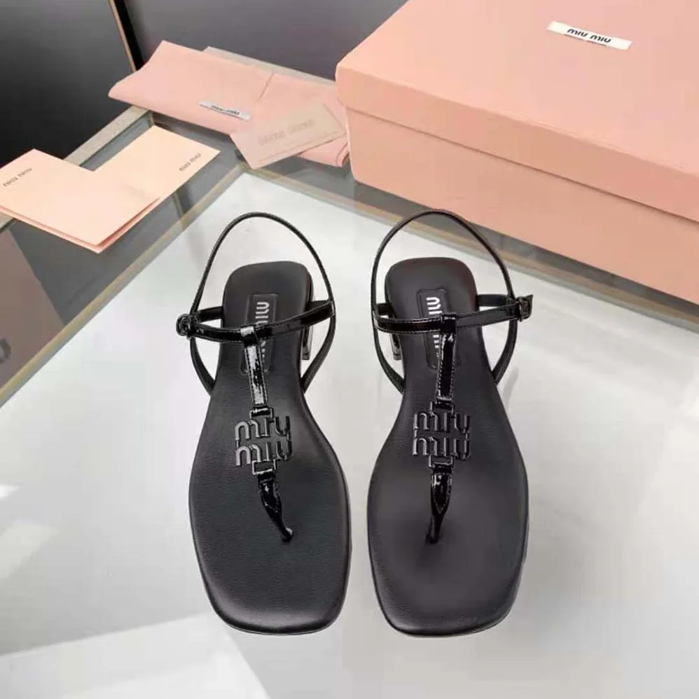 Miu Miu Patent Thong Sandals with Metal Lettering Logo for Women in Black Miu Miu Patent Thong Sandals with Metal Lettering Logo for Women in Black