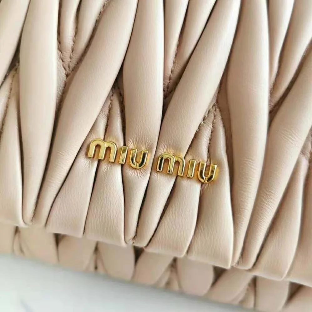 Miu Miu Matelasse Nappa Leather Shoulder Bag for Women in Pink Miu Miu Matelasse Nappa Leather Shoulder Bag for Women in Pink