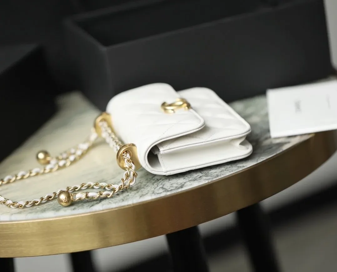 Chanel CO-CO Clutch With Chain in Gold Toned Hardware White Chanel CO-CO Clutch With Chain in Gold Toned Hardware White