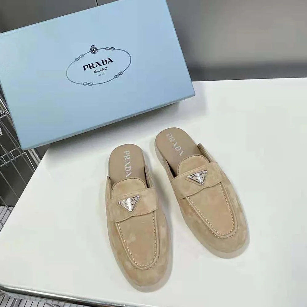 Prada Suede Leather Sabots with Enameled Metal Triangle Logo for Unisex in Brown