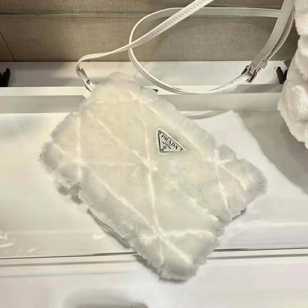 Prada Iconic Triangle Logo Soft Shearling Tote for Women in White Prada Iconic Triangle Logo Soft Shearling Tote for Women in White