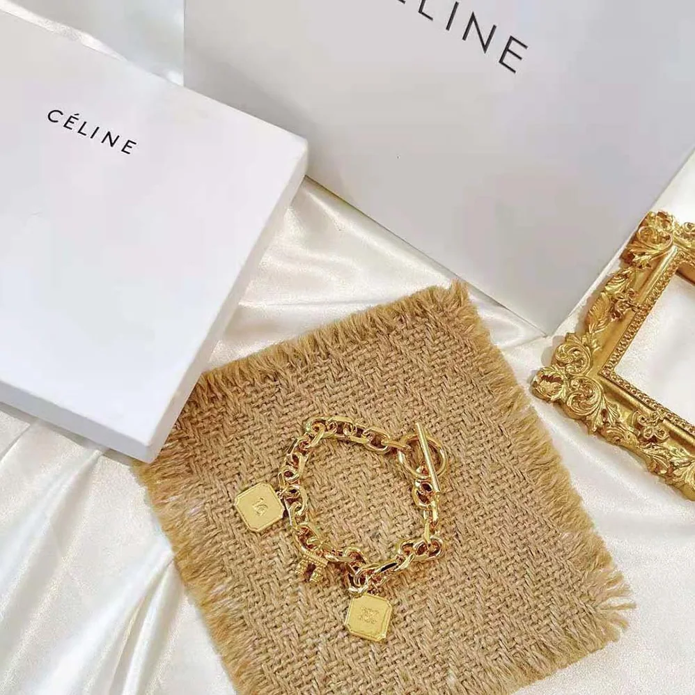 Celine Maillon Triomphe Charms Bracelet in Brass with Gold Finish for Women Celine Maillon Triomphe Charms Bracelet in Brass with Gold Finish for Women