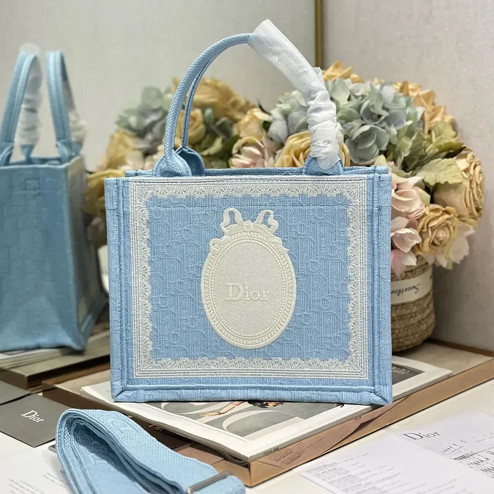 Dior Small Dior Book Tote with Strap Celestial Blue Dior Oblique Embroidery with White Lace and Dior Médaillon for Women Dior Small Dior Book Tote with Strap Celestial Blue Dior Oblique Embroidery with White Lace and Dior Médaillon for Women