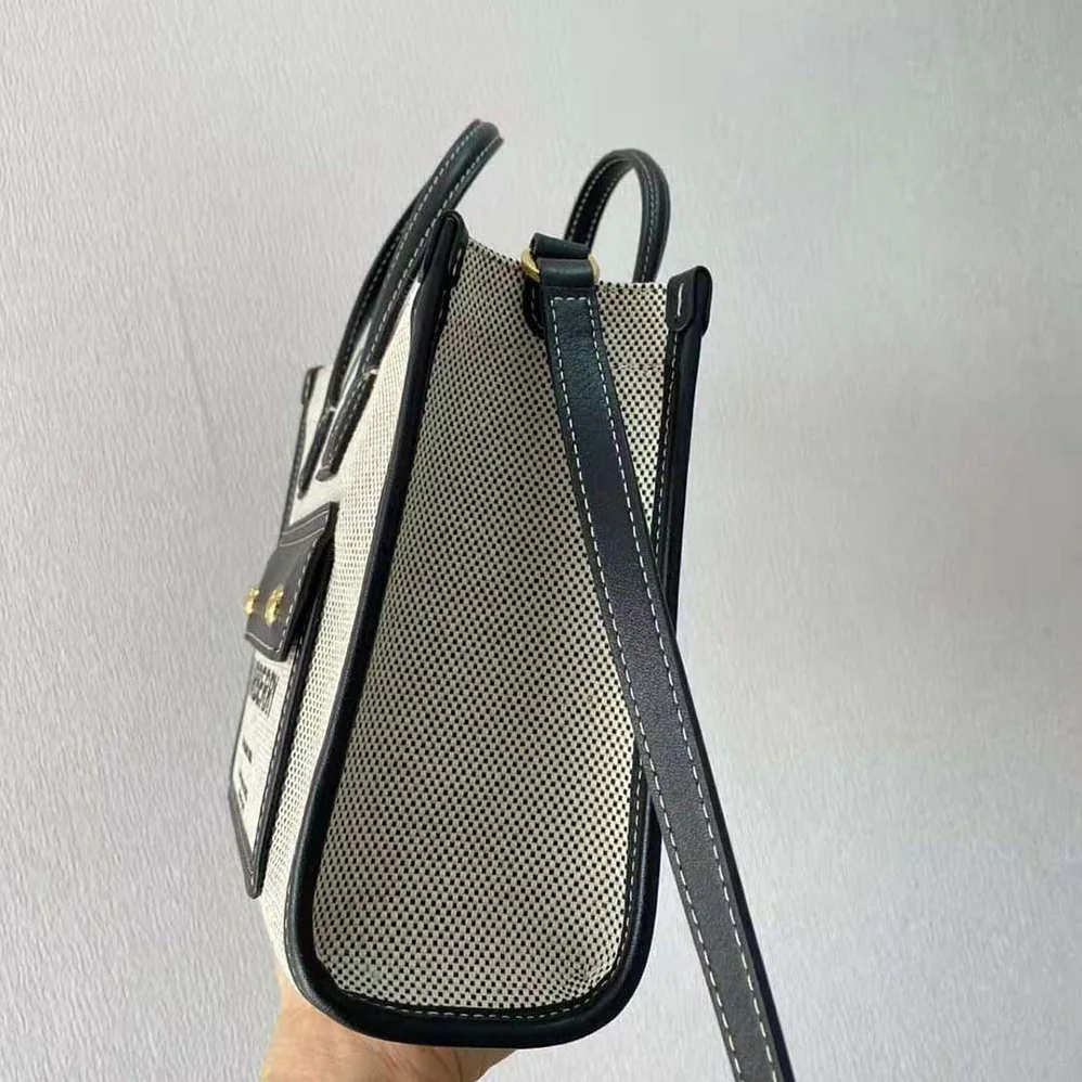 Burberry Mini Two-tone Canvas and Leather Freya Bag for Women in Silver Burberry Mini Two-tone Canvas and Leather Freya Bag for Women in Silver