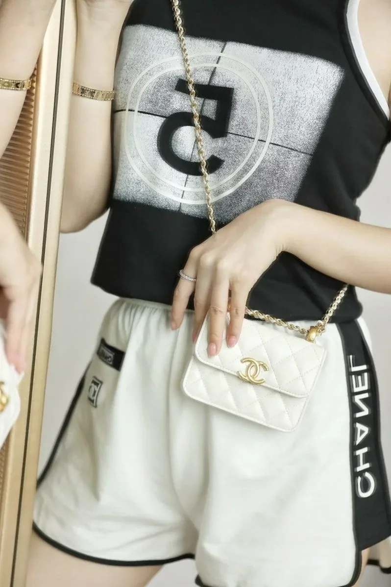 Chanel CO-CO Clutch With Chain in Gold Toned Hardware White Chanel CO-CO Clutch With Chain in Gold Toned Hardware White