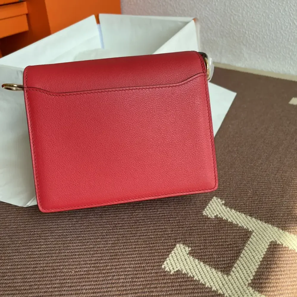 Hermes Roulis Mini Bag in Evercolor Calfskin for Women in Red/Gold