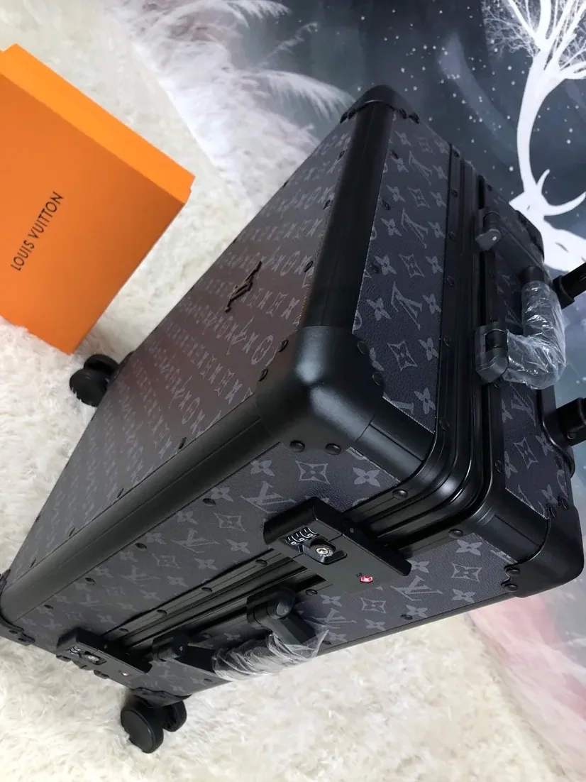 Louis Vuitton Rolling Trunk Black /