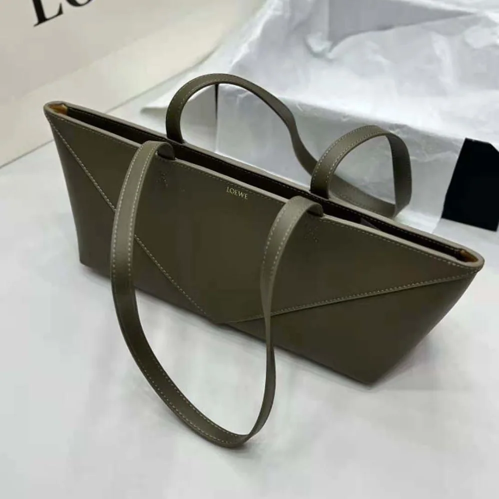 Loewe Cropped Puzzle Fold Bag in Shiny Calfskin for Women in Green Loewe Cropped Puzzle Fold Bag in Shiny Calfskin for Women in Green