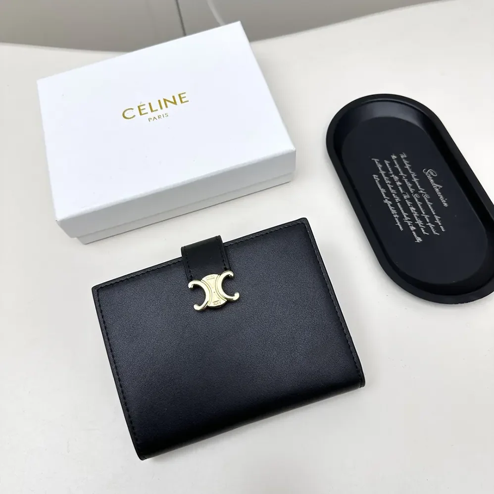 Celine Medium Strap Wallet Nino in Supple Grained Calfskin for Women in Black Celine Medium Strap Wallet Nino in Supple Grained Calfskin for Women in Black