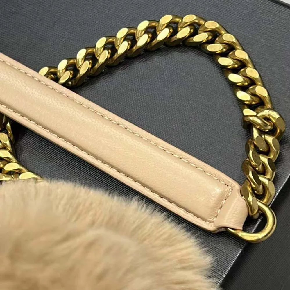 Saint Laurent YSL Puffer Small Bag in Merino Shearling and Lambskin for Women in Sandy Saint Laurent YSL Puffer Small Bag in Merino Shearling and Lambskin for Women in Sandy