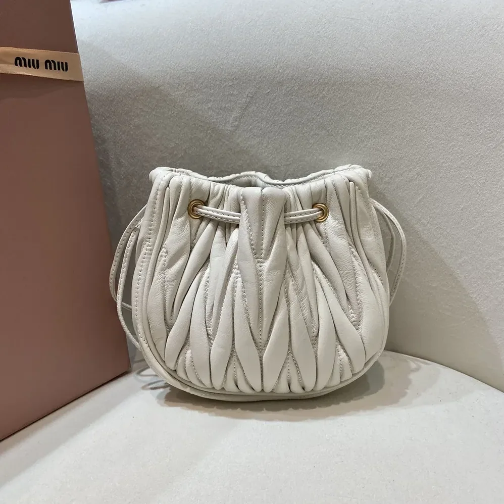 Miu Miu Matelassé Nappa Leather Pouch for Women in White Miu Miu Matelassé Nappa Leather Pouch for Women in White