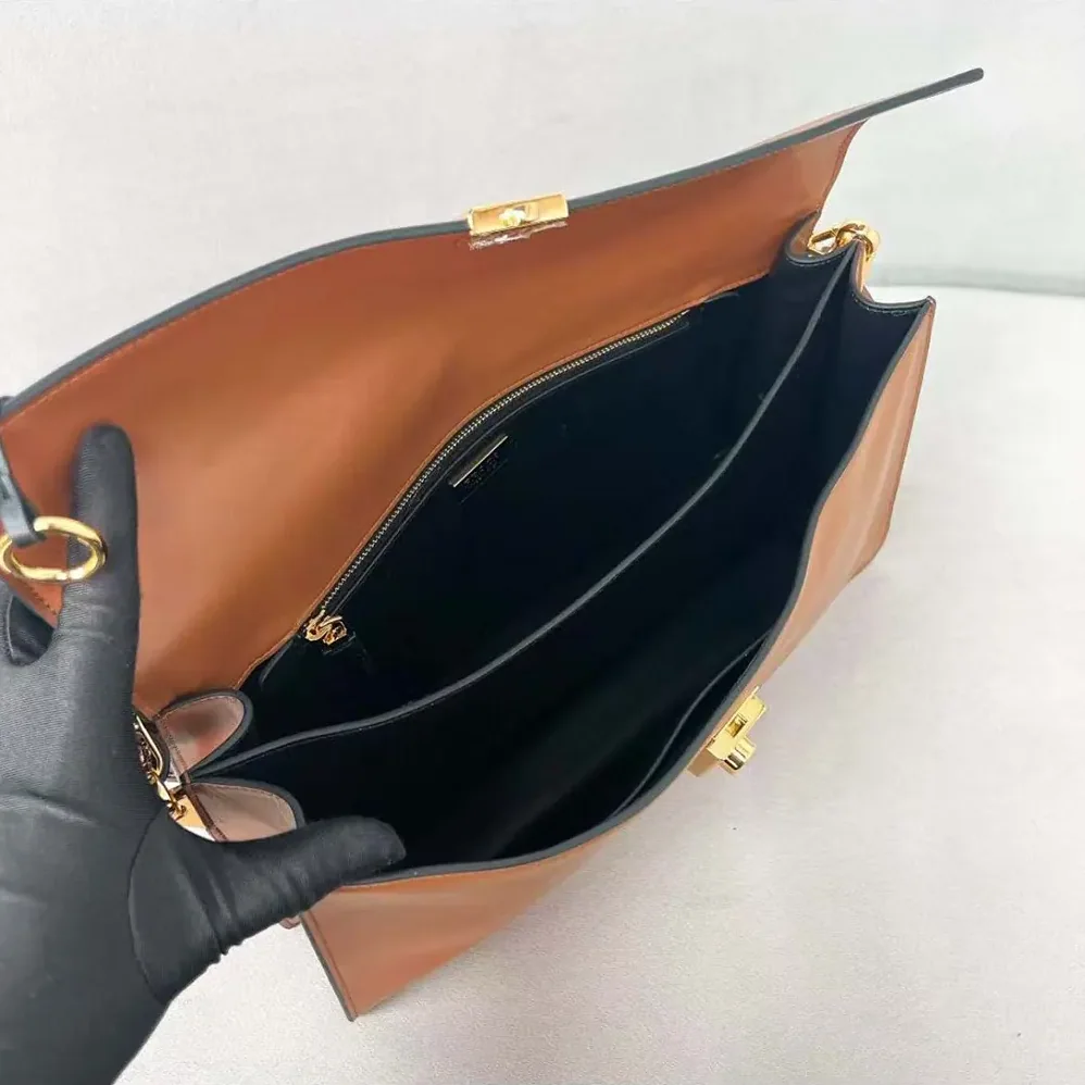 Prada Soft Sound Large Leather Shoulder Bag with Charms for Women in Brown