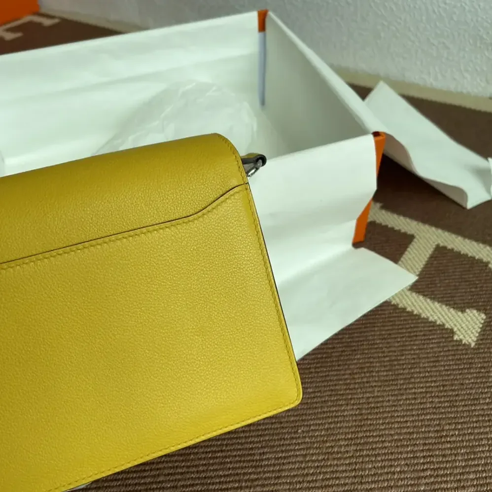 Hermes Roulis Mini Bag in Evercolor Calfskin for Women in Yellow/Gold Hermes Roulis Mini Bag in Evercolor Calfskin for Women in Yellow/Gold