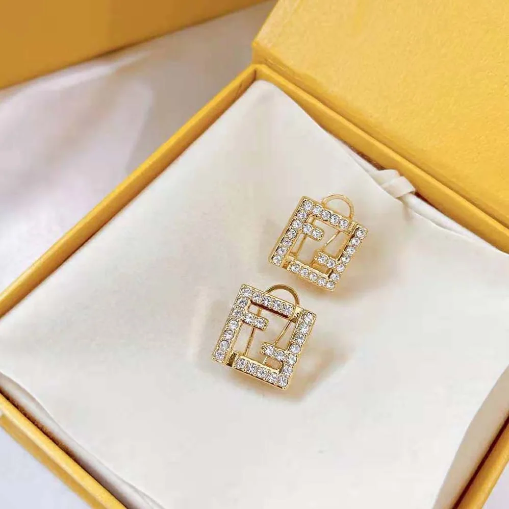 Fendi FF Earrings Gold for Women in Colored Fendi FF Earrings Gold for Women in Colored