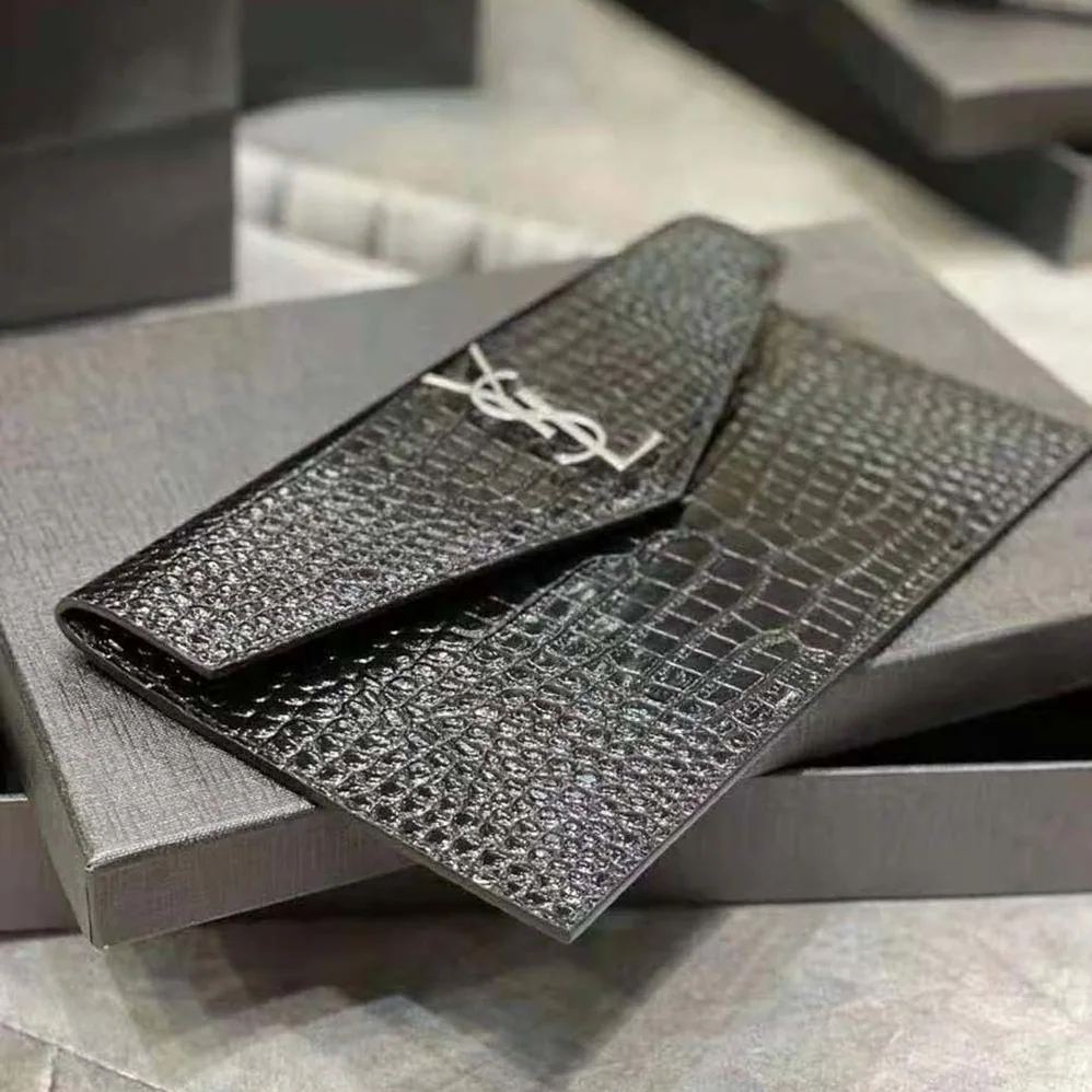 Saint Laurent YSL Uptown Pouch in Crocodile Embossed Shiny Leather for Women in Silver