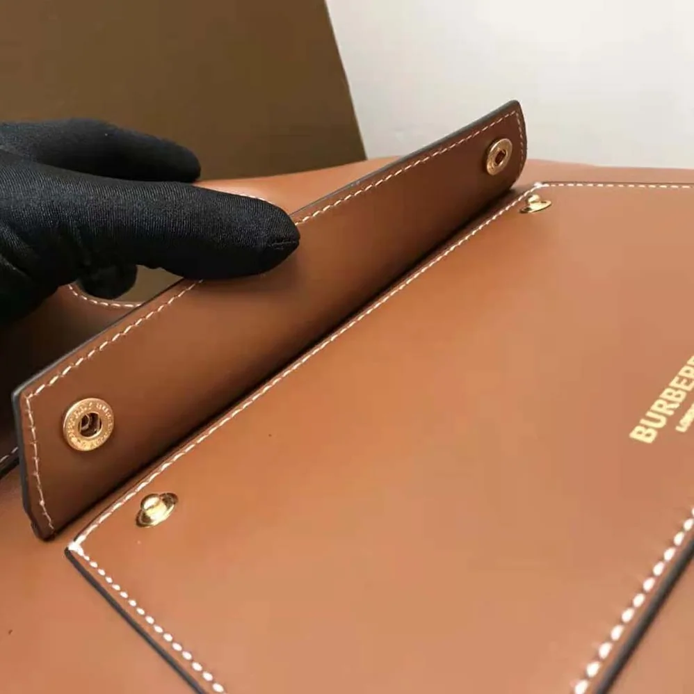 Burberry Mini Leather Soft Pocket Tote for Women in Brown Burberry Mini Leather Soft Pocket Tote for Women in Brown