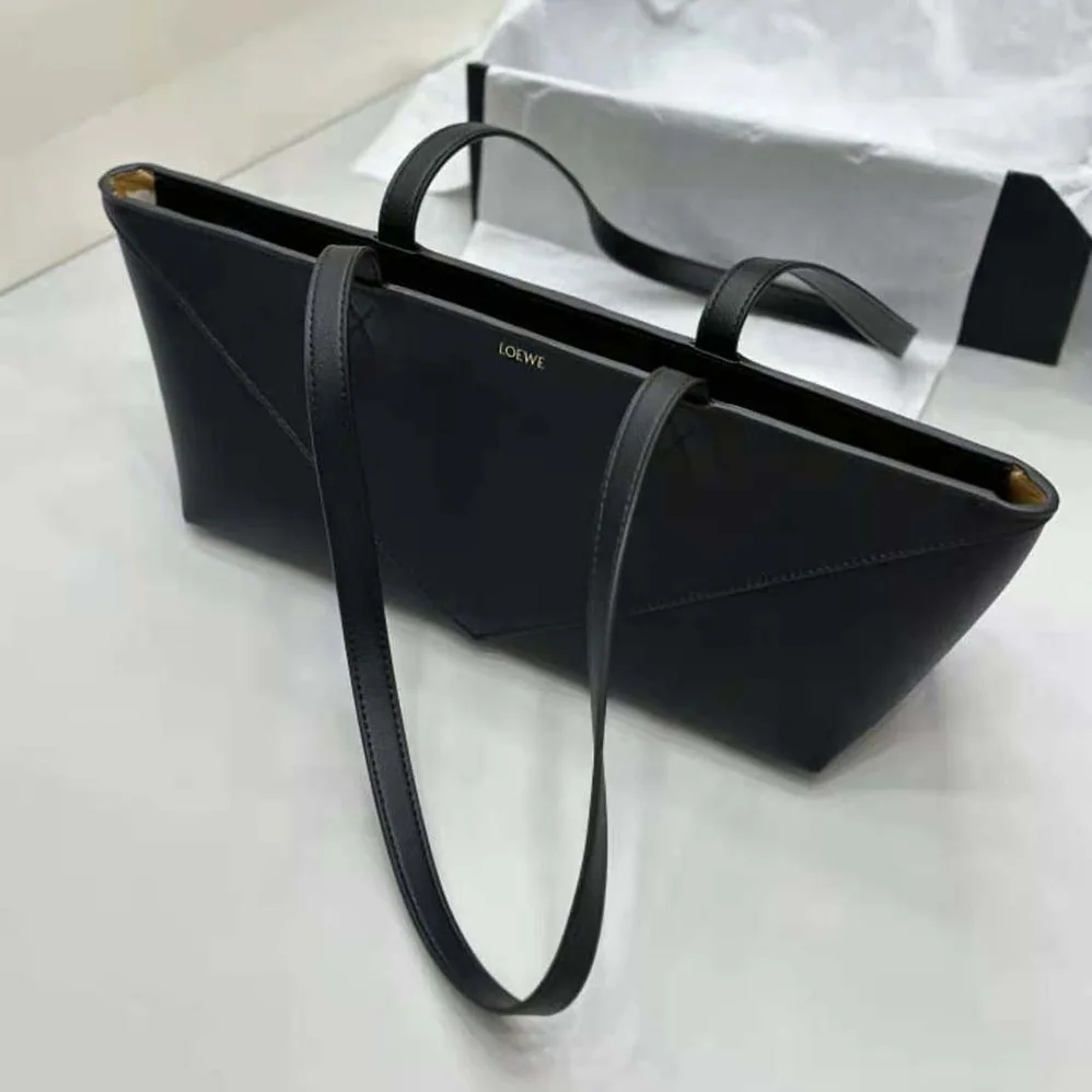 Loewe Cropped Puzzle Fold Bag in Shiny Calfskin for Women in Black Loewe Cropped Puzzle Fold Bag in Shiny Calfskin for Women in Black