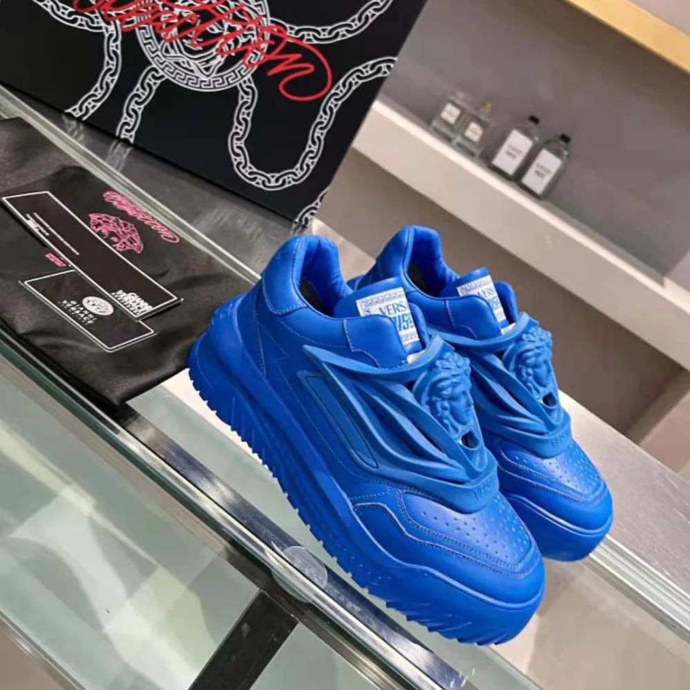 Versace Odissea Sneakers are Set on Rubber Soles with Perforated Toe Caps for Unisex in Blue Versace Odissea Sneakers are Set on Rubber Soles with Perforated Toe Caps for Unisex in Blue