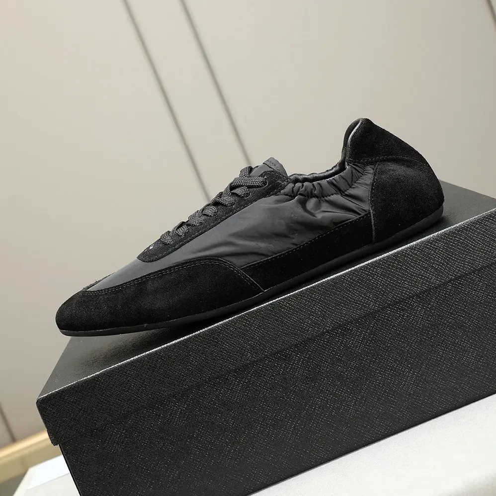 Prada Collapse Re-Nylon and Suede Elasticized Sneakers for Unisex in Black Prada Collapse Re-Nylon and Suede Elasticized Sneakers for Unisex in Black