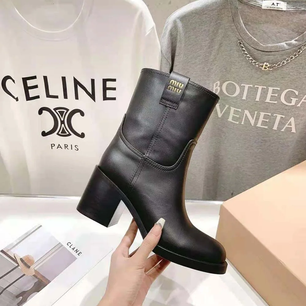 Miu Miu Leather Booties with Hot-stamped Logo for Women in Black
