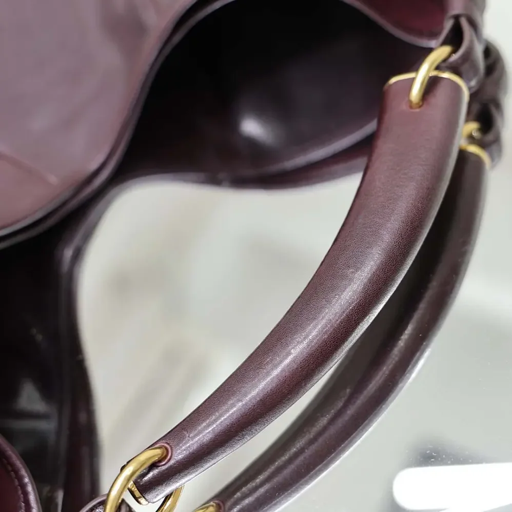 Saint Laurent YSL Mombasa Medium In Leather for Women in Rouge Cabernet
