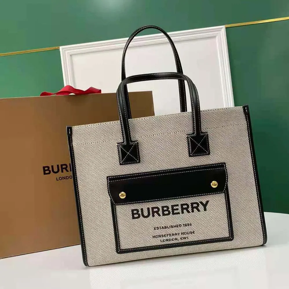 Burberry Medium Two-tone Canvas and Leather Freya Tote for Women in Black Burberry Medium Two-tone Canvas and Leather Freya Tote for Women in Black